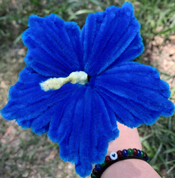A Blue Hibiscus made from pipe-cleaners.